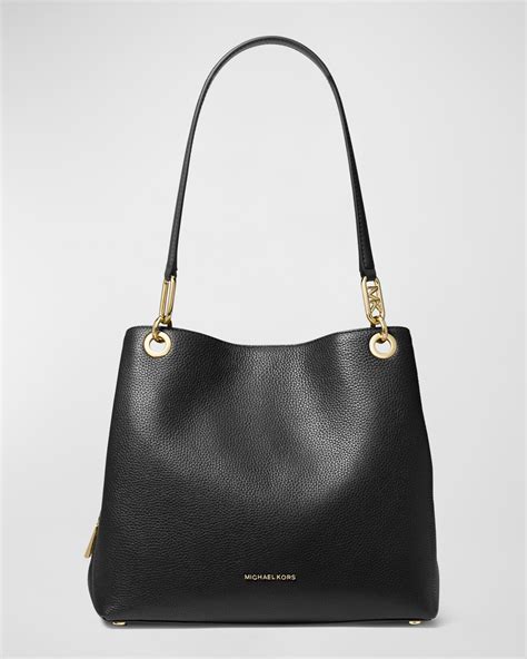 michael kors handbag made in china tag only|Michael Kors leather bag.